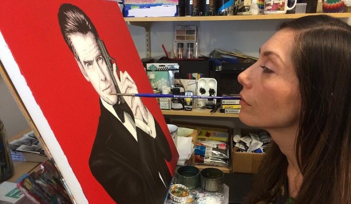 Artist Paralyzed by Gun Violence Catches the Attention of Pierce Brosnan
